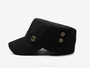 Side view of black cotton flat top military cap with golden metal plaque and eyelets