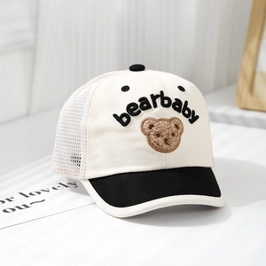 Detail of cute bear embroidery and breathable mesh on children's black and white sun cap