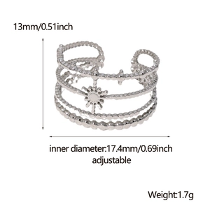 Detail of adjustable silver starburst ring with multi-layer beaded texture and dimensions