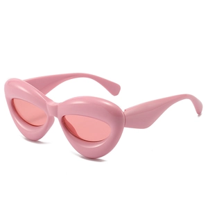 Chunky pink bubble cat eye sunglasses with thick frames and matching lenses for women