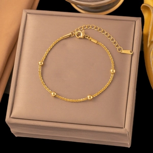 18k gold plated titanium anklet featuring small golden beads and adjustable lobster clasp