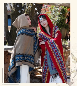 Bohemian ethnic style hooded shawl cape with vibrant heart patterns and fringes