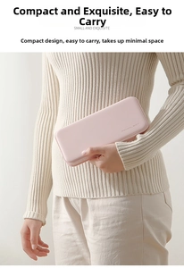 Pink minimalist rectangular pencil box with rounded edges shown held by hand