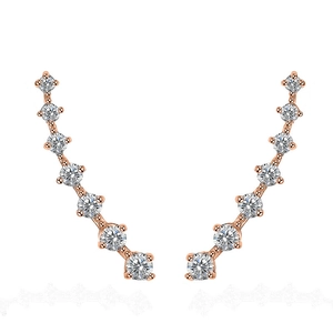 Detailed view of rose gold crawler earrings with seven graduated round-cut cubic zirconia