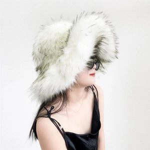 Detail of white faux raccoon fur hat with black tips showing thick and fluffy texture