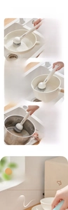 Detail of kitchen scrub brush set showing ergonomic long handle and versatile brush heads