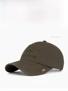 Detail of cotton twill baseball cap in military green with fine embroidered stitching