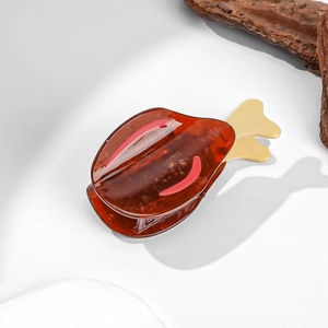 Creative chicken drumstick shaped acetate hair claw clip with a glossy amber resin finish