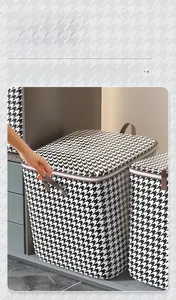 Details von verstärkten Griffen und Doppelreißverschluss bei Hahnentritt-Tasche