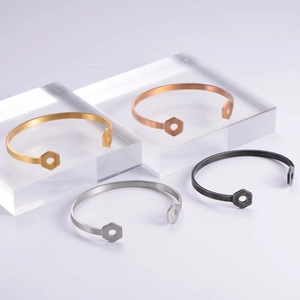 Industrial style hexagon nut cuff bracelets in gold, silver, black, and rose gold finishes