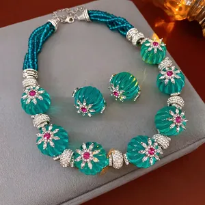 Vintage green faceted bead jewelry set with crystal flower necklace and earrings