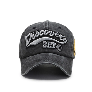 Distressed dark gray washed cotton baseball cap with 3D Discovery embroidery and yellow label