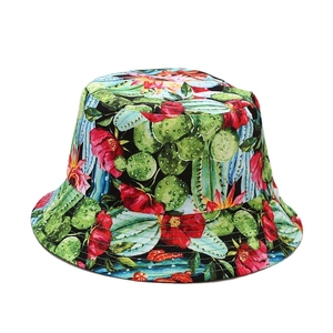 Reversible bucket hat with vintage black floral cactus print for outdoor sun protection