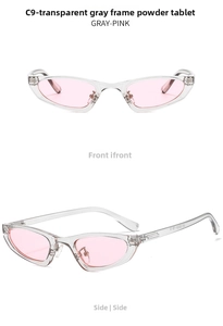 Detail view of cat eye sunglasses with translucent grey frames and soft pink lenses