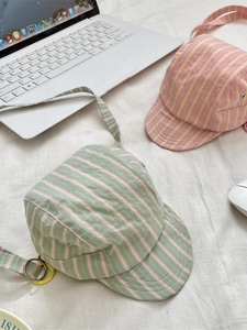 Vintage striped cap-shaped crossbody bags in green and pink cotton canvas