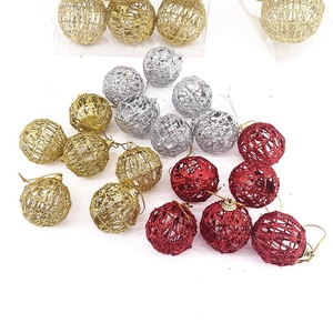 Glitter hollow wire Christmas balls in gold silver and red for festive tree decoration
