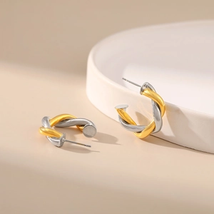 Hip hop style C-shaped twisted earrings in gold and silver mixed metal design