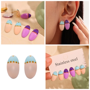 Detailed view of colorful enamel oval stud earrings made of 18k gold plated stainless steel
