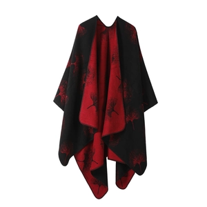 Double-sided knitted shawl in black and red with leaf pattern on a clean white background