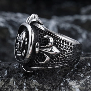 Vintage stainless steel skull ring with fleur-de-lis engraving in gothic punk style
