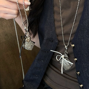 Bohemian silver mesh mini bag necklace with silk ribbon bow on a long bead chain