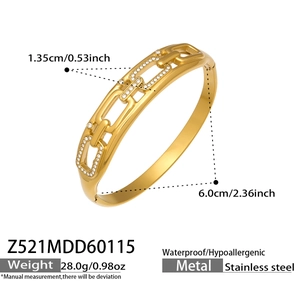 Detail of 18K gold-plated stainless steel geometric bangle with zircon-studded links