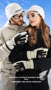 Detail of waterproof ski gloves with adjustable buckle and anti-slip palm texture