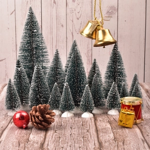 Detailed set of mini bottle brush Christmas trees with festive bells and ornaments