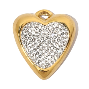 Close-up of heart-shaped gold-plated pendant set with sparkling white crystals
