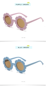 Detail view of flower-shaped kids' sunglasses in matte purple and blue finishes