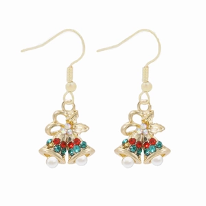 Detailed close-up of Christmas bell earrings with rhinestones and faux pearls