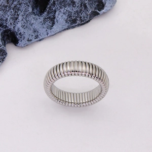 Detailed view of silver stainless steel flexible snake ring with spiral tubogas texture