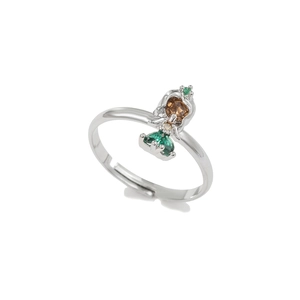 Detail of silver adjustable ring featuring a princess figure with colorful zircons