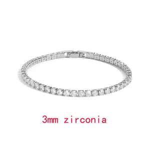 Detailed macro view of 3mm round cubic zirconia stones on silver tennis bracelet