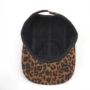 Detail of five-panel cap showing black inner sweatband and leopard print adjustable strap