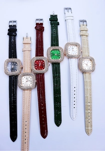 Detail showing various square diamond-encrusted watches with colorful leather straps