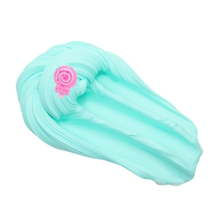 Close-up of light blue slime texture with a pink lollipop charm for sensory play