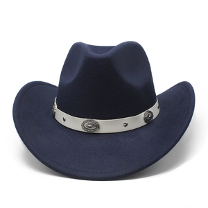 Detail of navy felt cowboy hat featuring beige leather band and silver metal conchos
