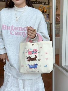 Simpatica borsa tote in velluto a coste con ricamo a gatto e manici rosa per l'ufficio