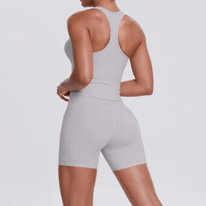 Detail view of the racerback sports top and shorts with side pocket for active women