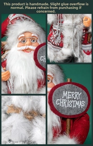 Detailed close-up of handmade Santa Claus doll showing fur beard and Merry Christmas sign
