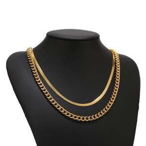 Detail of 18K gold-plated double-layer necklace set with snake and Cuban links