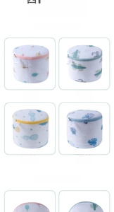 Detail of cylinder and shell mesh laundry bags featuring colorful nordic floral patterns