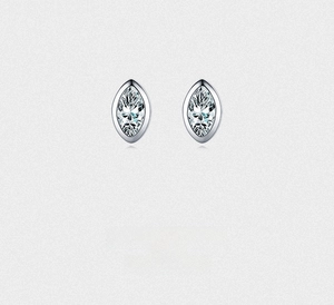 Macro detail of marquise-cut stud earrings in a bezel setting with sparkling stones