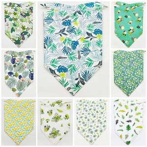 Nine assorted fruit and leaf print pet bandanas in various tropical styles and colors