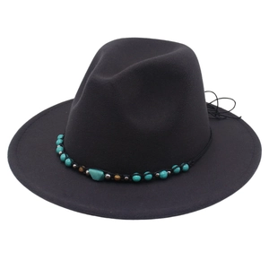 Classic black felt western cowboy hat with turquoise beaded band and wide brim design