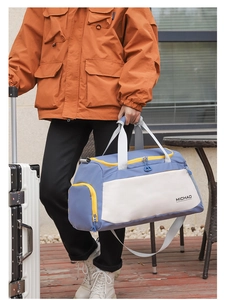 Large capacity travel duffel bag waterproof sports gym bag for weekend short trips.