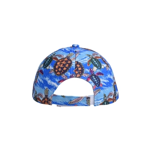 Detail of adjustable velcro strap and sea turtle print on the blue baseball cap