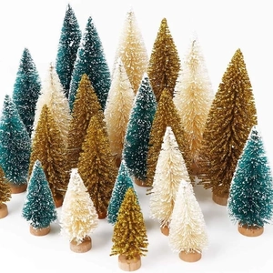Mini Christmas trees in green, gold and white with snow flocking on wooden bases