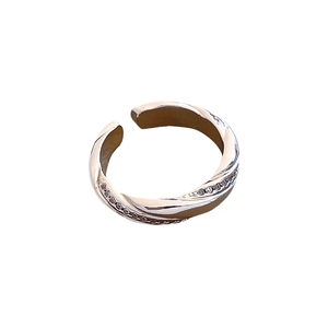 Silver twisted rope ring with zircon accents in an adjustable open minimalist design